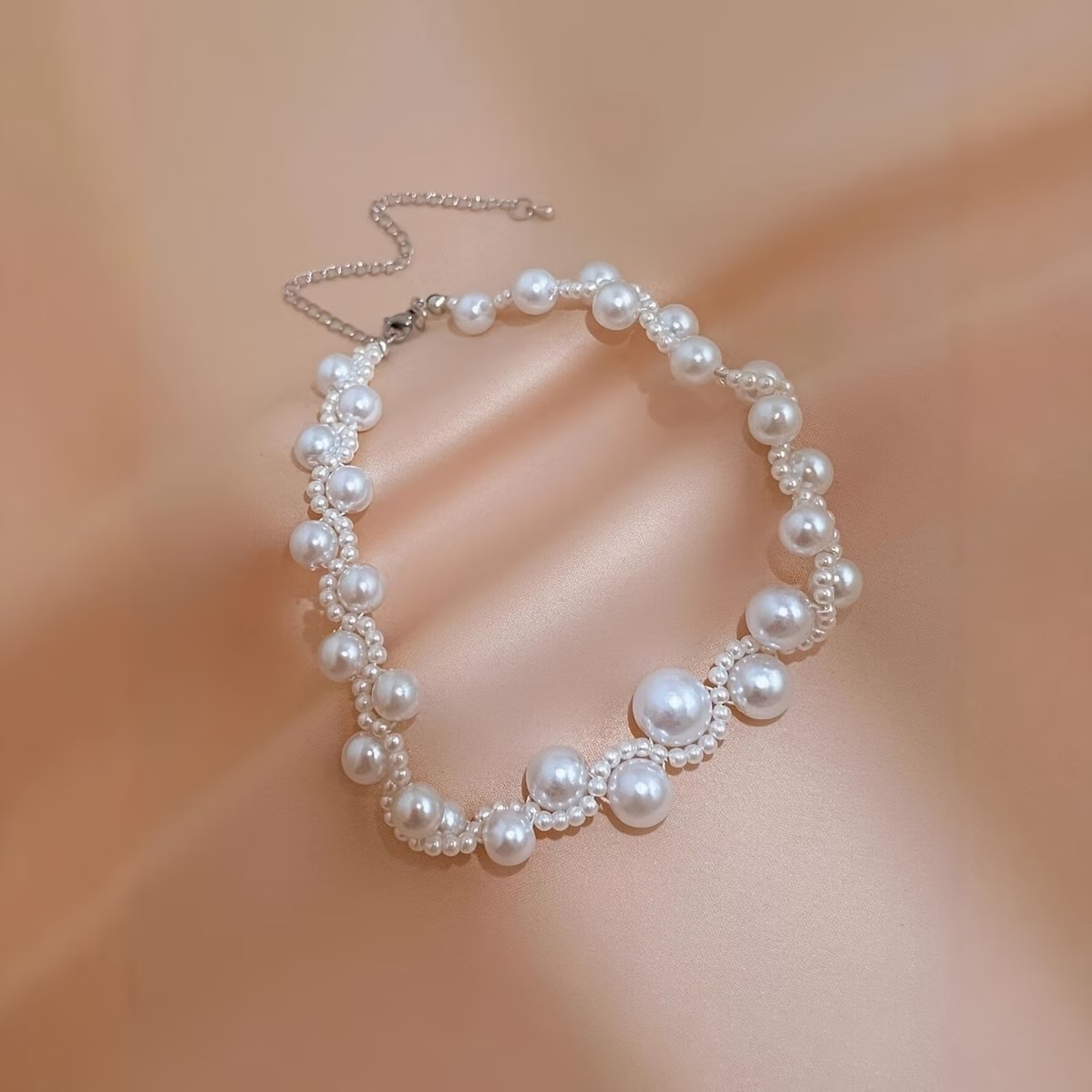A timeless pearl necklace that brings an elegant and sophisticated finish to both special-occasion and everyday looks.