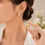 Premium light-sensitive teardrop earrings with starburst moissanite, 1 unit