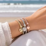 Women's metallic style bracelet set with heart pendants, 3 pack