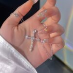Rhinestone Starburst Cross Pendant Necklace