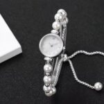 Women’s Rose Gold Pearl Bracelet Watch - Image 8
