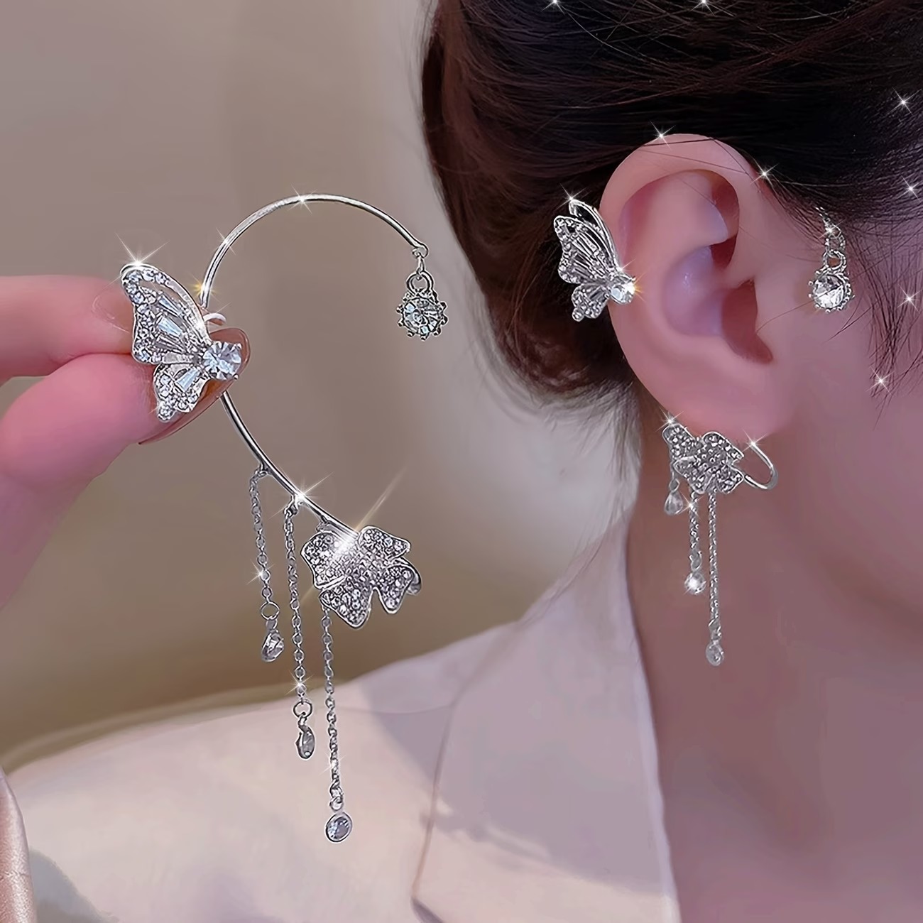 Butterfly Tassel Ear Cuff Clip Earrings – No Piercing Rhinestone Ear Wrap (5) Butterfly Tassel Ear Cuff Clip Earrings – No Piercing Rhinestone Ear Wrap - Image 1